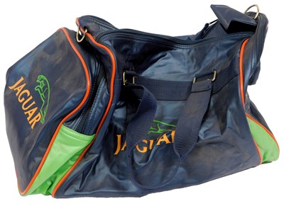 Lot 63 - A Jaguar kit bag, in metallic blue and lime...