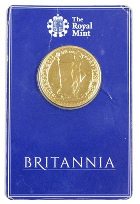 Lot 9 - A Royal Mint Britania half ounce gold bullion...