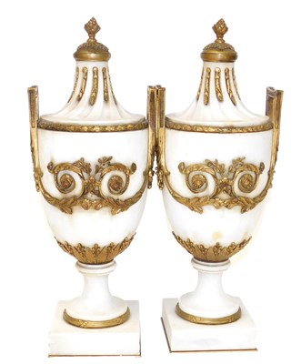Lot 17 - A pair of French Louis XVI style marble and...