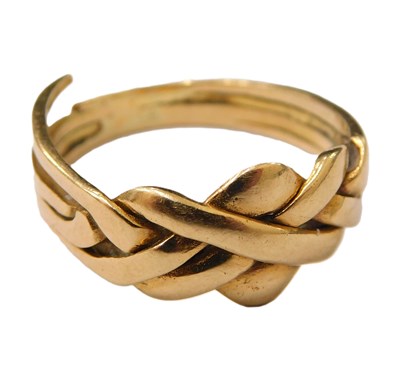 Lot 620a - A middle Eastern yellow metal ring,...
