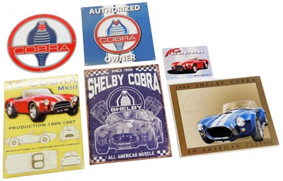 Lot 35 - Reproduction Shelby Cobra signs, including...