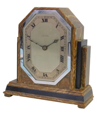 Lot 116 - A 1930s Art Deco golden onyx mantel clock,...