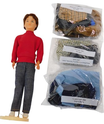 Lot 659 - A Pedigree Paul doll and outfits, including...