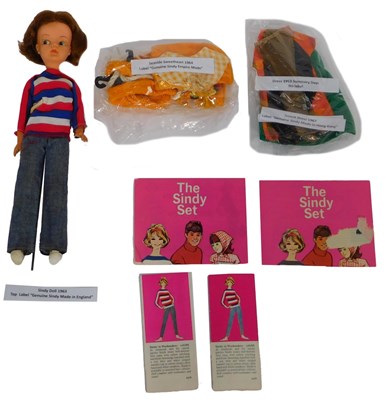 Lot 660 - A Pedigree Sindy doll 1963 and outfits,...