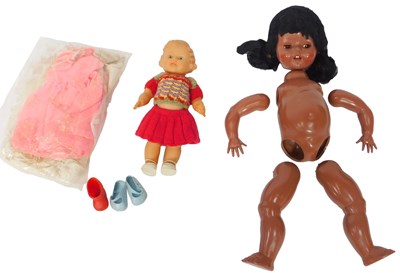 Lot 749 - A Pedigree doll with sleep eyes, (AF), and a...