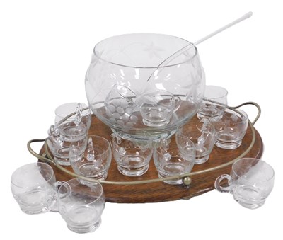 Lot 149 - A cut glass punch set, engraved with vines,...