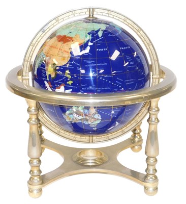 Lot 159 - A hard stone terrestrial globe, in a white...