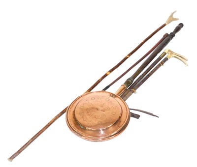Lot 171 - A Victorian copper bed pan, with a turned...