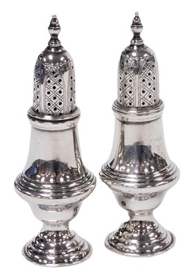Lot 128 - A pair of Edward VII silver pepperettes, of...