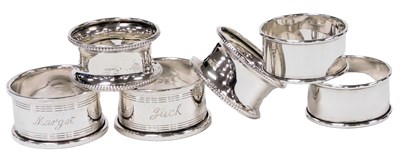 Lot 130 - A pair of George V silver napkin rings,...
