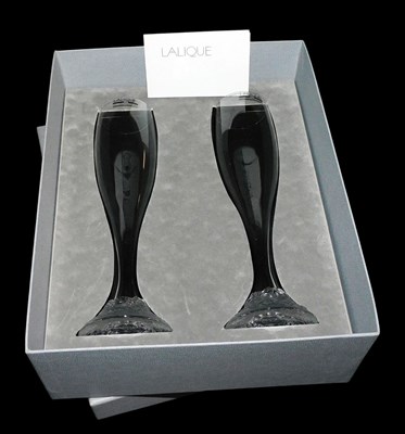 Lot 235 - A pair of Lalique millennium celebration...