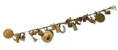 Lot 408 - A charm bracelet, yellow metal, marked 9c,...