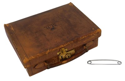 Lot 409 - A brown leather jewellery box, initialled to...