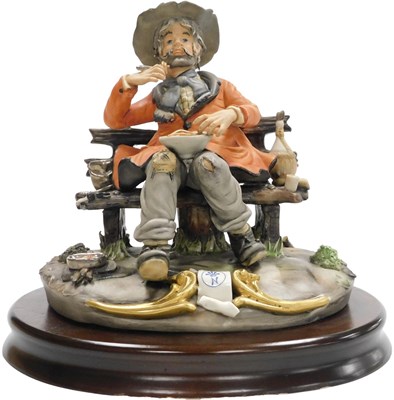 Lot 287 - A Capodimonte porcelain figure of a tramp, by...