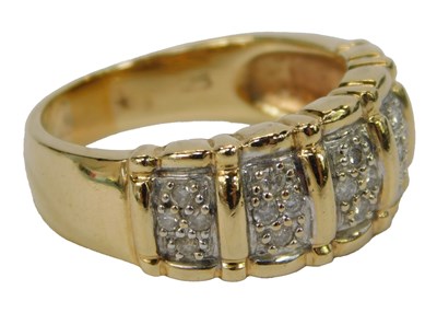 Lot 410 - A diamond ring, in a five-section pave setting,...