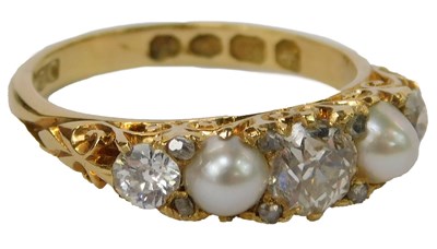 Lot 405 - An 18ct gold diamond and pearl ring, set with...