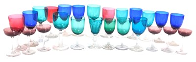 Lot 296 - A group of Edwardian coloured wine glasses, in...