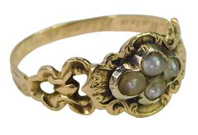 Lot 415 - A Victorian seed pearl Memorium ring, the four...