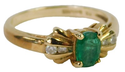 Lot 425 - A 9ct gold emerald and diamond bow ring, the...