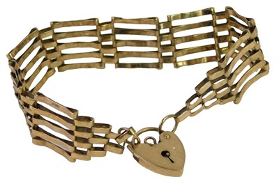 Lot 431 - A 9ct gold five-bar gate bracelet, on a...