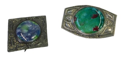 Lot 432 - Two Arts & Crafts pewter brooches, each inset...