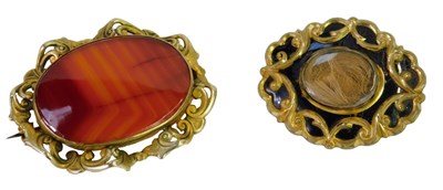 Lot 433 - A Victorian memorial brooch, with hair work...