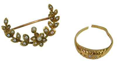 Lot 435 - A Victorian seed pearl brooch, central flower...