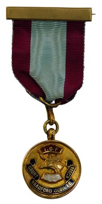 Lot 301 - A 9ct gold and enamel LBC Bradford Jubilee...