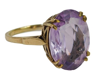 Lot 439 - A 9ct gold and amethyst ring, in claw set...
