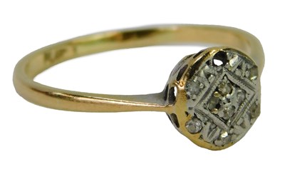 Lot 441 - A diamond illusion set ring, yellow metal,...