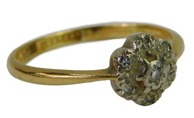 Lot 442 - A diamond floral cluster ring, yellow metal,...