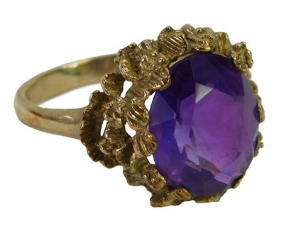 Lot 443 - A 9ct gold and amethyst ring, the oval stone...