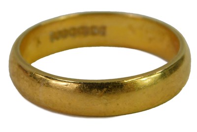 Lot 444 - A 22ct gold wedding band, size P, 5.5g.