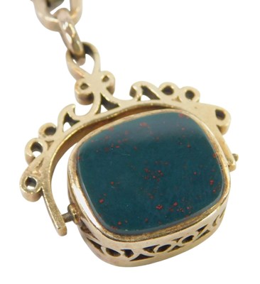 Lot 450 - A 9ct gold swivel fob, set with black onyx and...
