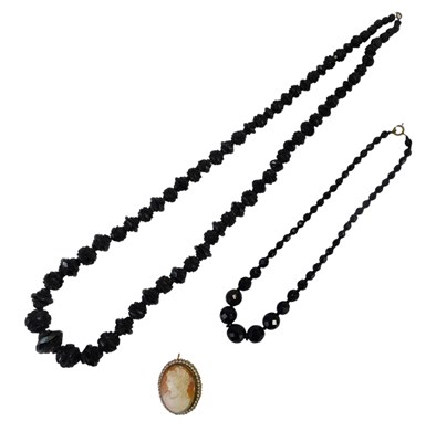 Lot 457 - Two Victorian jet necklaces, together with a...