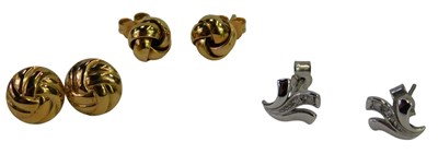 Lot 458 - Two pairs of knot earrings, yellow metal...