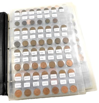 Lot 516 - An album of British 20thC silver and copper...