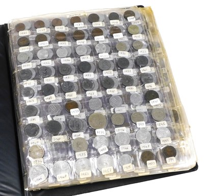 Lot 517 - An album of European silver and copper coinage,...