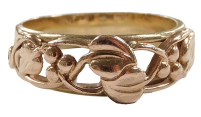 Lot 414 - A Welsh Clogau 9ct two coloured gold band,...