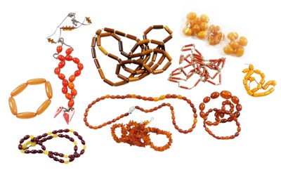 Lot 355 - Assorted amber and simulated amber bead...