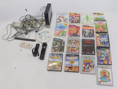 Lot 692 - A Nintendo Wii console, Nintendo Wii and...