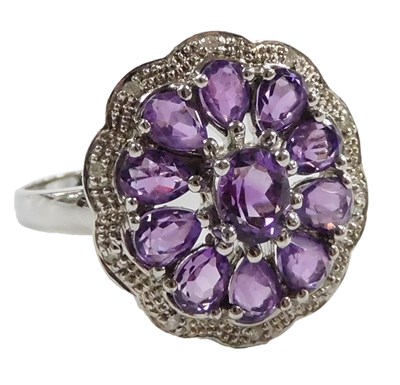 Lot 553 - A 9ct white gold amethyst and diamond ring, in...
