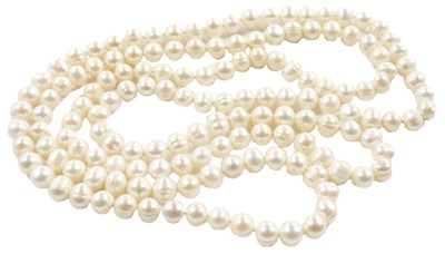Lot 559 - A string of freshwater pearls, approx 120cm long.