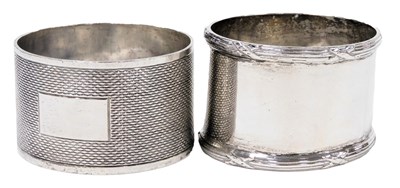 Lot 573 - A George V silver napkin ring, Chester 1928,...