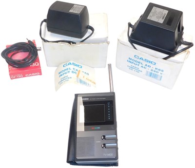 Lot 2212 - A Casio LCD pocket colour television, together...