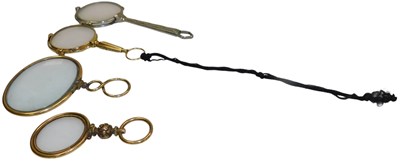 Lot 531 - A pair of early 20thC gold plated lorgnettes,...