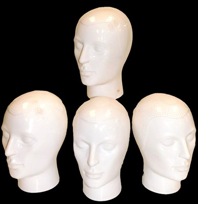 Lot 547 - Four 20thC Royal white glaze pottery busts, 25....