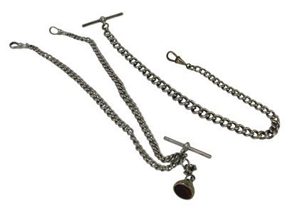 Lot 314 - Two silver curb link watch chains, each with a...