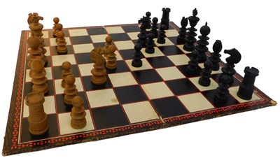 Lot 136 - An ebony and boxwood chess set, height of King...