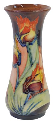 Lot 145 - A Moorcroft pottery Tulip pattern vase,...